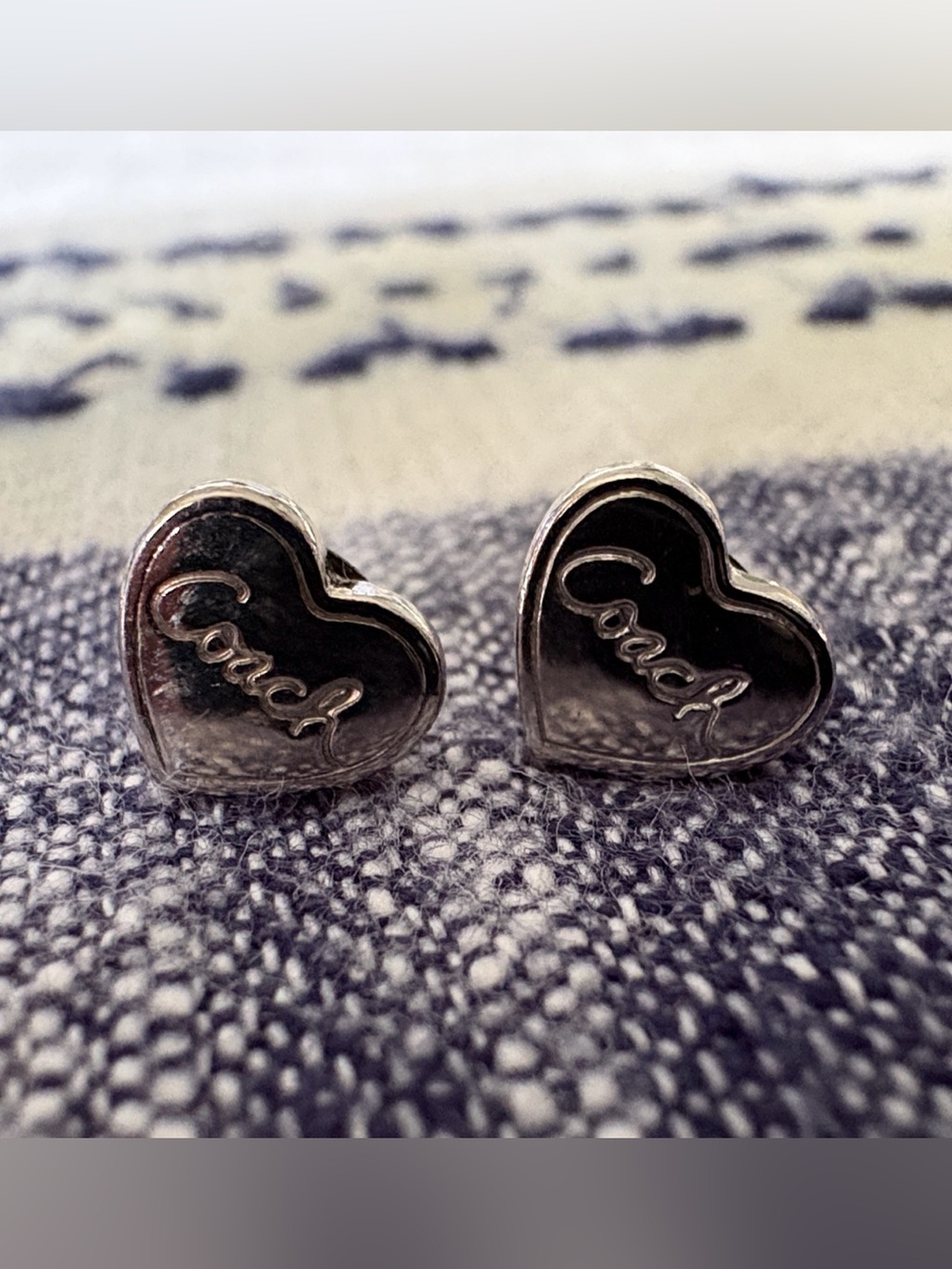 Coach Women’s Silver Heart Shaped Stud Earrings